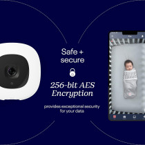 Nanit Pro Smart Baby Monitor displayed next to a woman sitting on a couch with a suitcase.